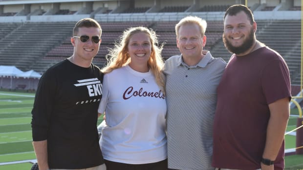 Thomas Bowling, Kristen Peterson and Zach Vigliotti with Walt Wells.
